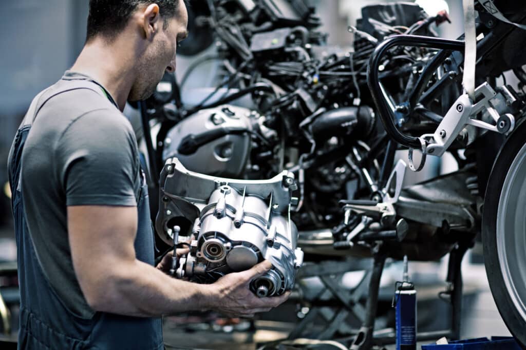 Male mechanic in a repair workshop